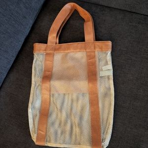 Hillary Duff with Love Mesh bag/purse with brown faux leather straps